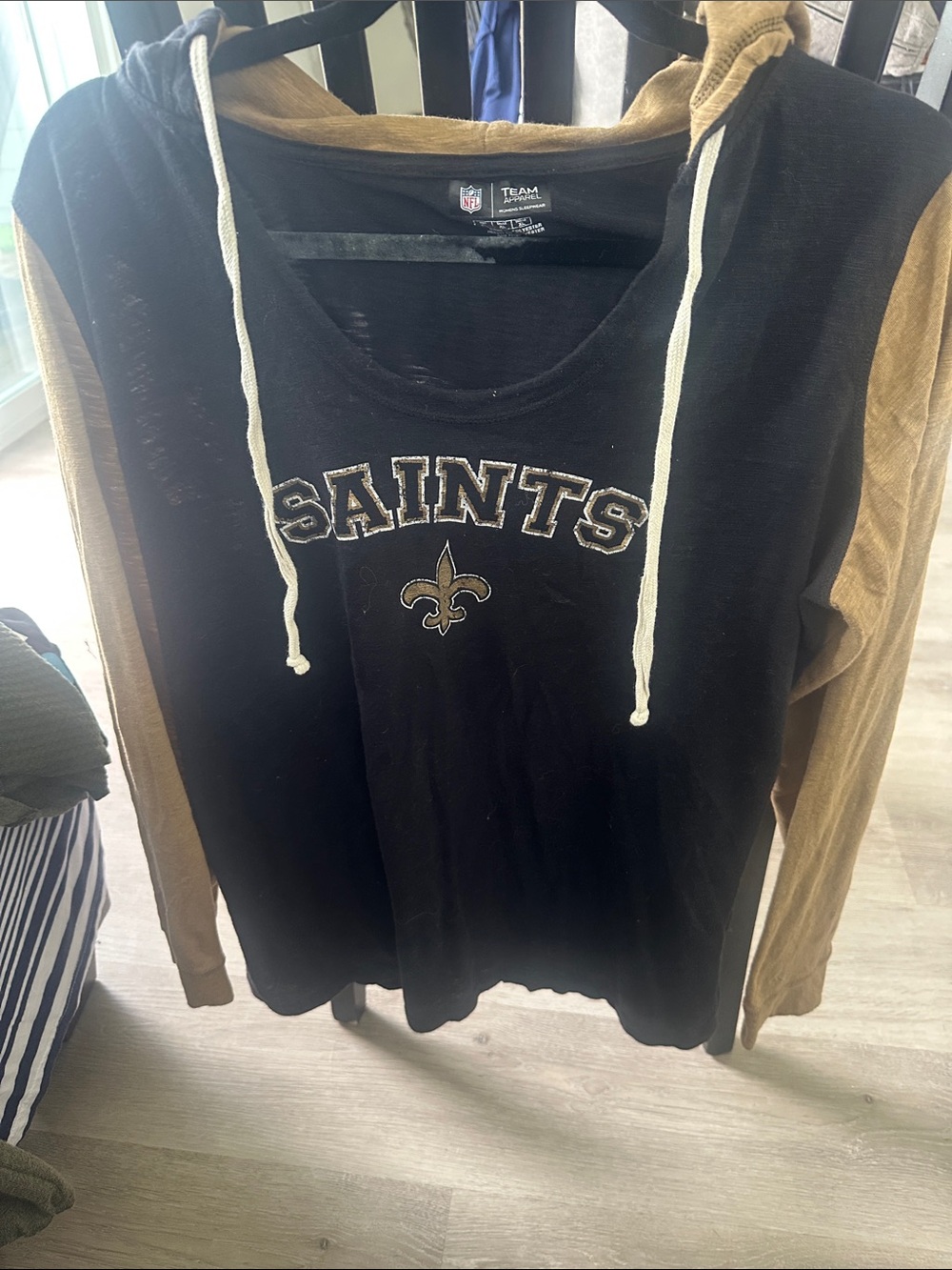 NFL New Orleans Saints Black and Gold Long Sleeve Hooded Tee
